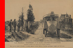 Les Autobus *SCEMIA*  la sortie d'ANIZY-LE-Chteau passent devant des prisonniers boches inactifs Au second plan  droite, la seule maison reste debout, habite quelques temps par le kaiser